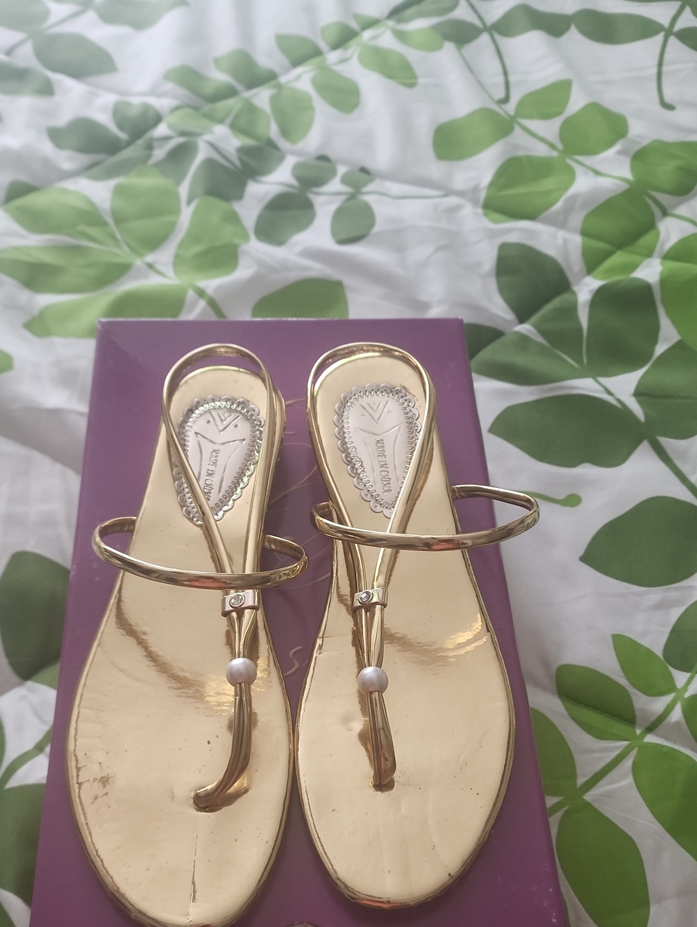 Gold Metallic T-Strap Women’s Sandals with Pearl Accent